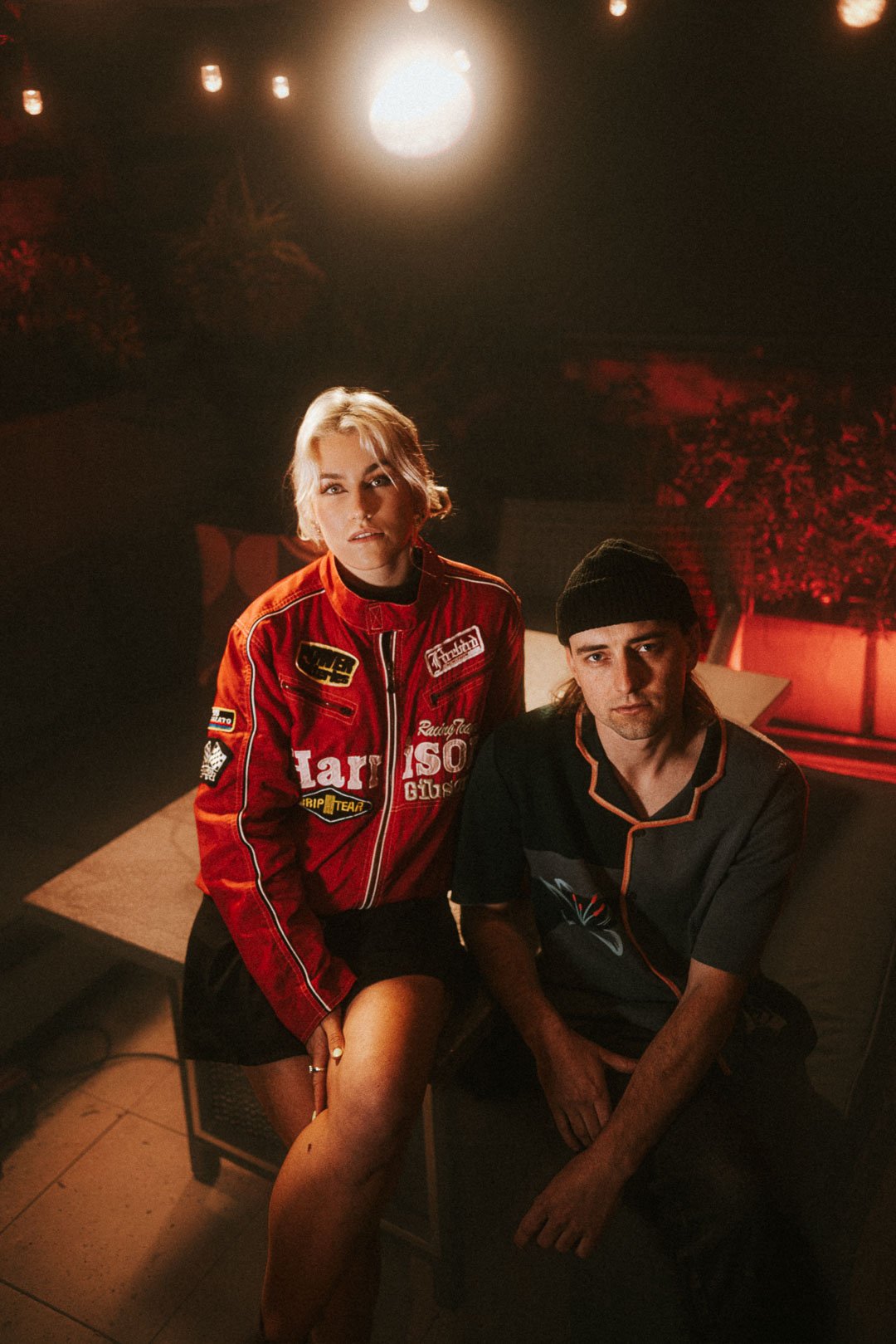 Foley looking up toward the camera during an intimate Mood on the Roof performance.